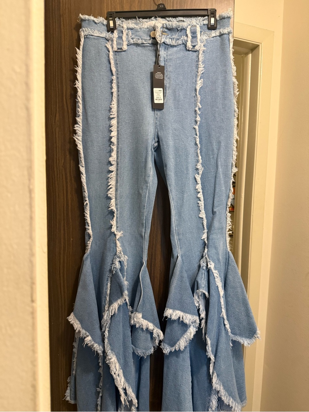 Fashion Nova Light Blue Distressed Ruffle Flare Jeans